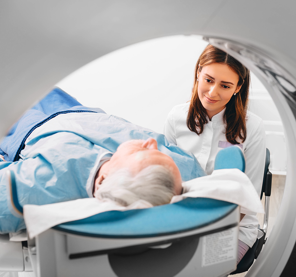 A doctor preparing a patient for an MRI scan as part of their epilepsy diagnosis