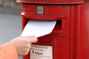 Posting postal vote in letterbox