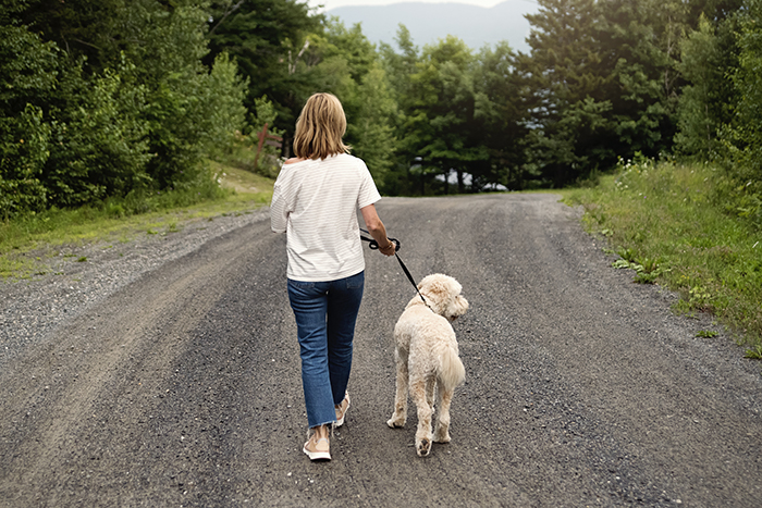 Woman going for a walk with her dog