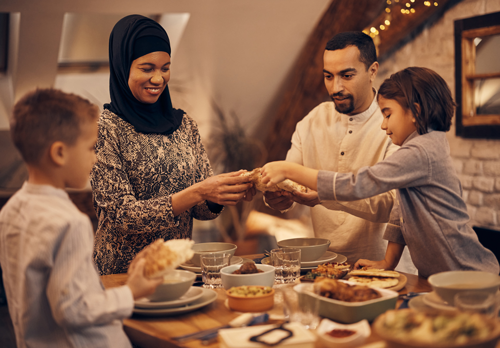 A family breaking their fast with iftar