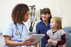 Nurse talking to mother and daughter about fenfluramine