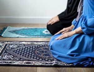 Muslim prayers in Tashahhud posture